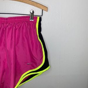 🦋Pink Nike shorts with neon yellow and black detailing with silver logo swish!